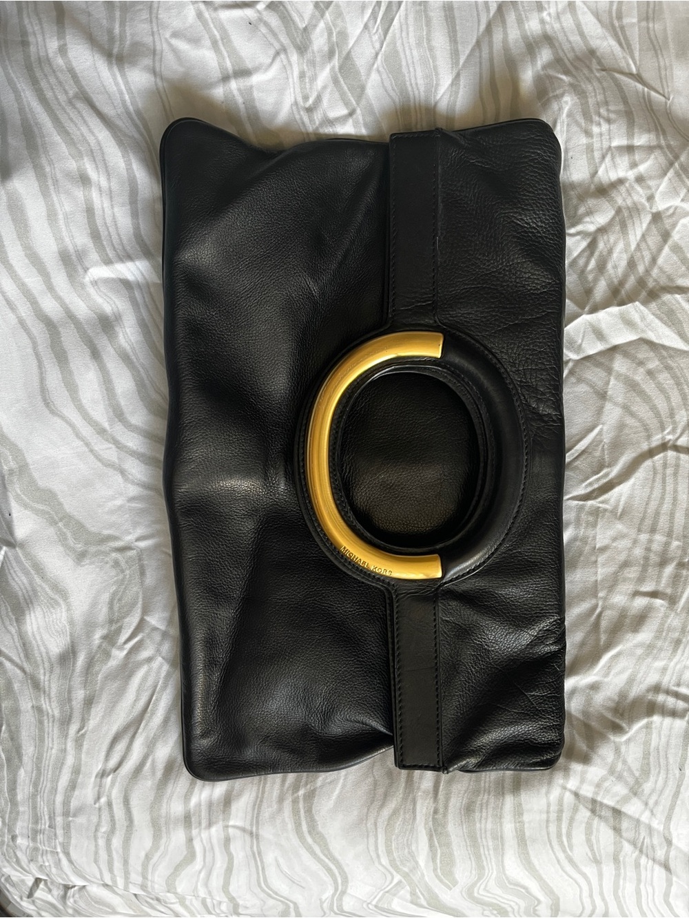 MICHAEL Michael Kors Black Leather Clutch with Gold Ring Handle